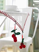 Crocheted cherry tablecloth clips