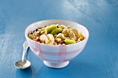 Bircher muesli with fruits in bowl