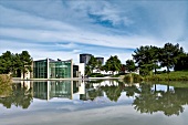 Water with reflection of Skoda pavilion in Autostadt, Wolfsburg , Germany