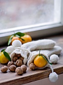 Close-up of socks and nuts on window sill
