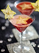 Büfetts, Granatapfel-Cocktail, mit Sternfrucht Scheiben dekoriert