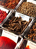 Various spices in glass bowls