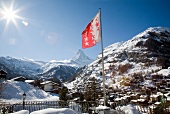 View of Matterhorn mountain and Valais flag in Switzerland