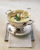 Allgau cheese soup with watercress pesto in serving dish