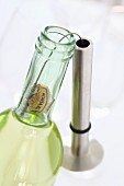 A gadget for removing broken cork from a bottle of wine