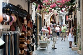 Tourist shopping in the alley of Rethimnon, Greece