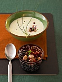 Potato soup and trout tartar in bowl
