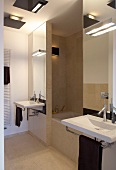 Modern bathroom with two sinks and tub