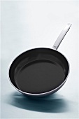 Silit pan with non-stick surface on white background