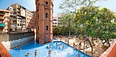 People in swimming pool, Platja de l'Eixample, Barcelona, Spain