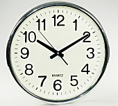 Close-up of wall clock on white background