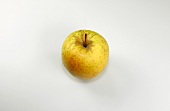 Close-up of golden delicious apple on white background