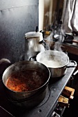 Steaming pots on a stove