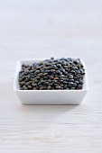 Green lentils in bowl