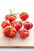 Close-up of ox heart tomatoes on wooden surface