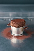 Chocolate souffle in stainless steel container