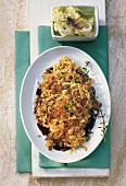 Allgau cheese noodles with salad in serving dish
