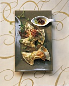 Swabian ravioli with brown butter on plate