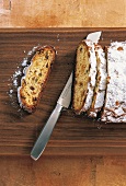 Close-up of quark stollen sliced on wooden platform