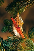 Close-up of various tree ornaments hanging on Christmas tree