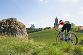 Cyclist riding bike at Franconian Switzerland Nature Park, Bavaria, German