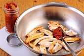 Roasted chicken with pesto rosso in bowl, step 2