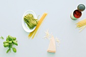 Ingredients for pasta on plate and on white background