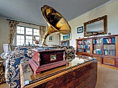Fireplace room with gramophone on table in Abbeyglen Castle Hotel, Galway, Ireland