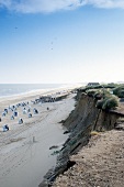 View of beach chairs, bar and dunes on West beach in Westerland, Sylt, Germany