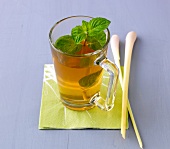 Mint and lemongrass tea in glass jar