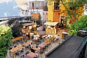 People at courtyard of restaurant and cafe Chapito in Lisbon, Portugal