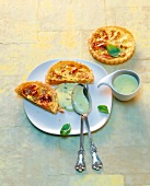 Tartlets with oranges and sweet basil hollandaise on plate