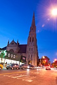 View of church and vehicles on road at Park Slope, New York, USA