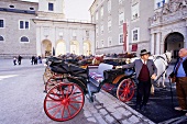 View of people near horse carriage in Salzburg