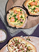Three salmon tart in baking dish, overhead view
