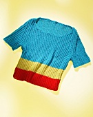 Cropped sweater on blue background