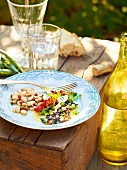 White beans and lentil salad with blue cheese on plate, France