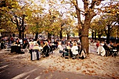 People at beer garden in the courtyard of Augustiner Brau, Salzburg, Austria