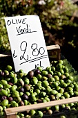 Close-up of green olives in market, Bellagio