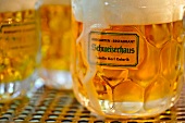 Close-up of beer glass in Swiss House, Prater, Vienna, Austria