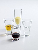 Liqueurs in different types of glasses