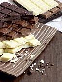 Couverture chocolates on wooden board