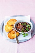 Duck ragout with millet cakes