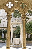 Arcades and columns of old Dominican monastery in Dubrovnik, Croatia