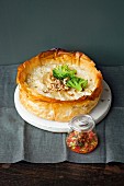 Puff pastry pie with ricotta, broccoli and nuts