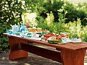 Wooden table with variety of dishes