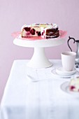 Blackberry cheesecake on a cake stand