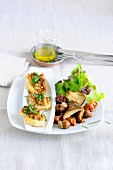 Mushroom salad with walnut crostini in serving dish