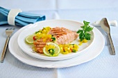 Salmon with lime and chilli butter on plate