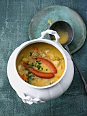Potato soup with sausages in soup taurean